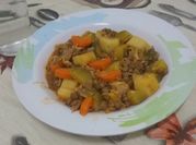 Una foto de guiso de pollo con comino