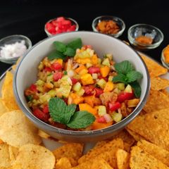 A picture of Grilled pineapple and mango salsa.