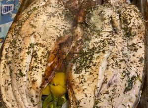 Una foto de Boga al horno con vegetales