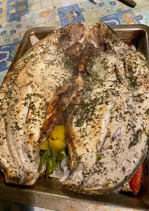 Una foto de Boga al horno con vegetales