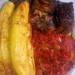 Grilled plantain with titus fish and pepper sauce A picture of Grilled plantain with titus fish and pepper sauce.