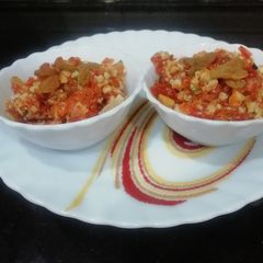 A picture of Carrots Halwa with Raisins.
