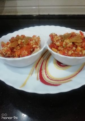 A picture of Carrots Halwa with Raisins.