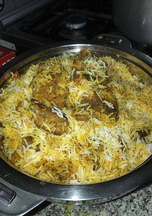 صورة لوصفة برياني سمك مع سلطه البصل