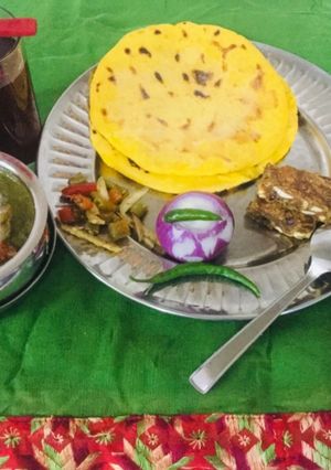 A picture of Sarson Ka Saag with Makki Ki Roti.