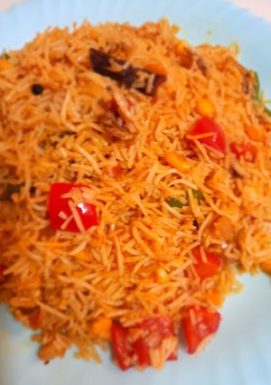 A picture of Mushroom and corn pulao.