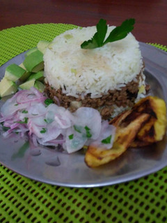 Una foto de Arroz tapado