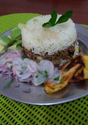Una foto de Arroz tapado