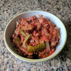A picture of Sausage and Peppers (Cajun) over Penne.