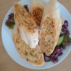 Garlic baguette bread A picture of Garlic baguette bread.