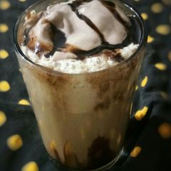 A picture of Chocolate cold coffee with ice-cream.