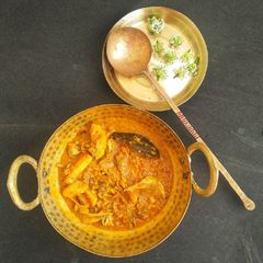 A picture of Mung Dal With Fish Head (Macher Matha De Mung Dal).