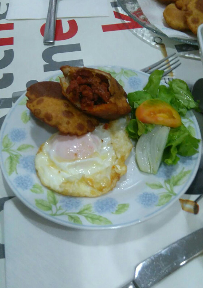 Una foto de Tortos con Picadillo