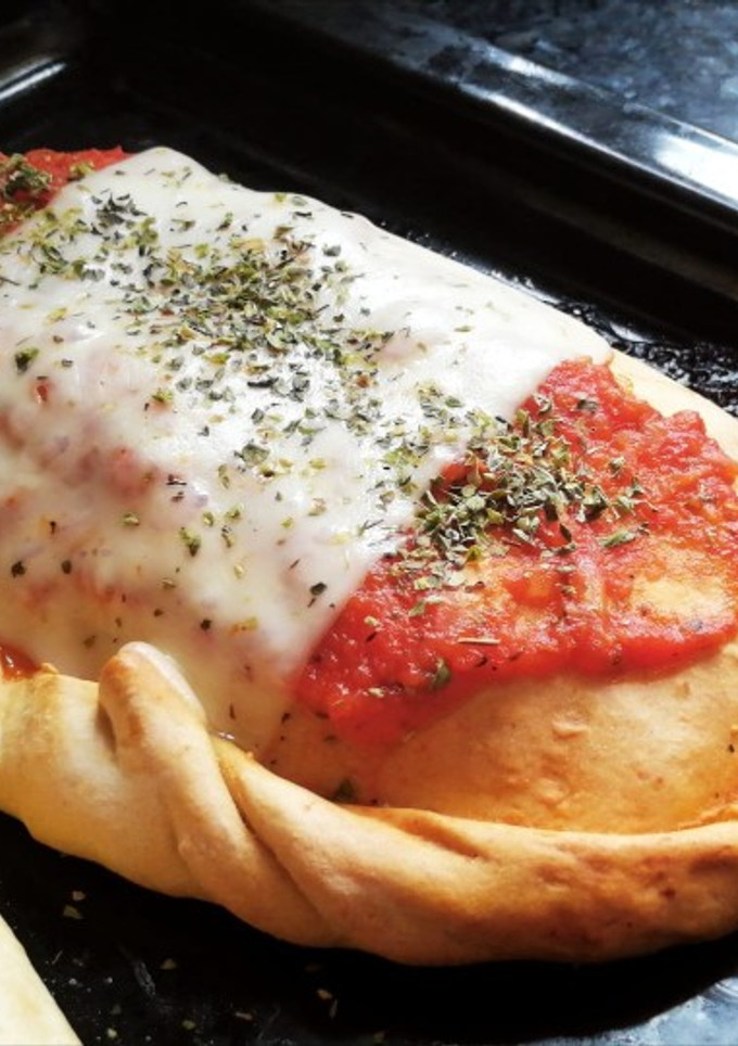 Una foto de Calzone de jamón y queso