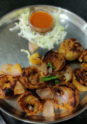 A picture of Tandoori veg momos.