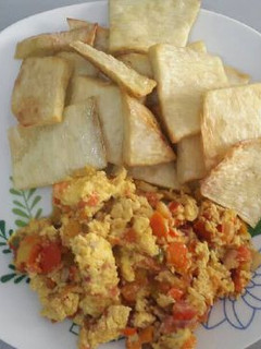 A picture of Fried yam with fried egg.