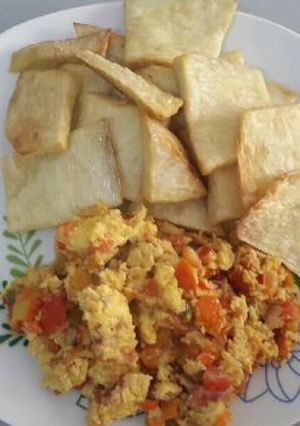 A picture of Fried yam with fried egg.