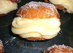 Una foto de Ricas bombas rellenas con crema pastelera de naranja