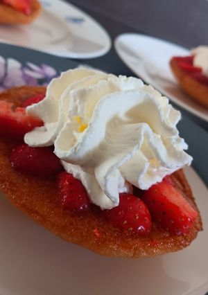 A picture of Egg cake with strawberry's.