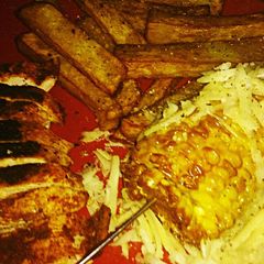 Tex's Paprika Chicken with Fried Corn on the Cob 🌽🐔🧀 A picture of Tex's Paprika Chicken with Fried Corn on the Cob 🌽🐔🧀.