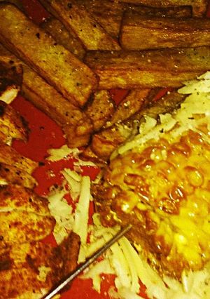 A picture of Tex's Paprika Chicken with Fried Corn on the Cob 🌽🐔🧀.