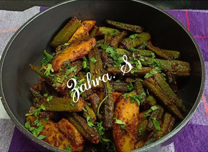 A picture of Dry bhindi aloo sabzi without onion and ginger garlic.