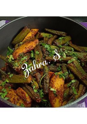 A picture of Dry bhindi aloo sabzi without onion and ginger garlic.