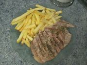 Una foto de churrasco de bondiola