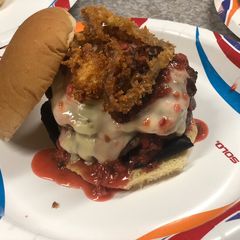 A picture of Creamy Jalapeño Stuffed Burgers with Raspberry Chipotle Sauce.