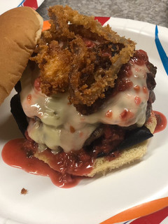 A picture of Creamy Jalapeño Stuffed Burgers with Raspberry Chipotle Sauce.