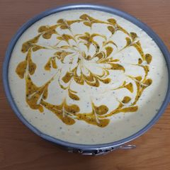A picture of Mango and Passionfruit Cheesecake.