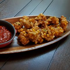 A picture of Shrimps and corn fritters.
