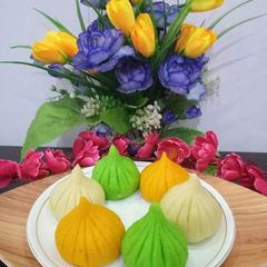 A picture of Colourful suji modak.