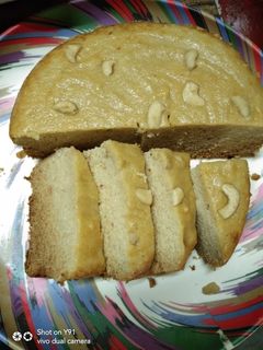 কাঁঠালের রস ও নারিকেল দিয়ে কেক(kanthaler ros aur narikel cake recipe in Bengali) রেসিপির প্রধান ছবি