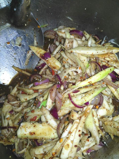 A picture of Spicy Green Mango Salad with Toasted Rice.