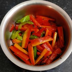 A picture of Carrot & capsicum sambharo.