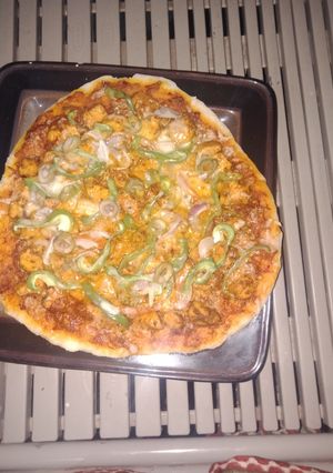 A picture of Home made pizza 🍕 Without oven.