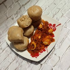A picture of Alkubus with onion sauce.