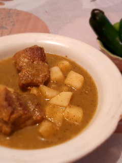 Una foto de Costilla de cerdo en salsa verde asada con papas