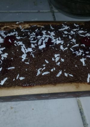 Una foto de Budín ingles integral bañado de crema de cacao