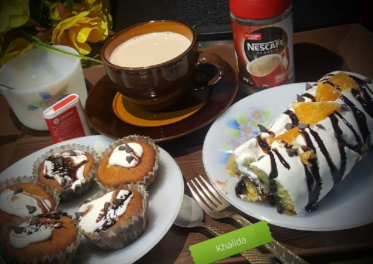 CHOCOLATE CHIP ORANGE SWISS ROLL, CUP CAKES AND MILK COFFEE