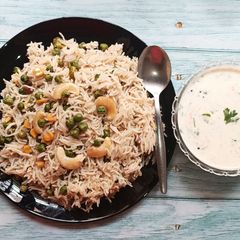 A picture of Green Peas Pulav With Raita.