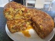 Una foto de patata y huevo con morcilla
