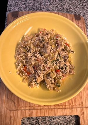 Una foto de Cuscús con puerro, pimentón y champiñones