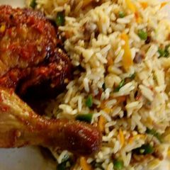 A picture of Toasted beef rice and peppered chicken.