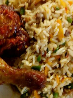 A picture of Toasted beef rice and peppered chicken.