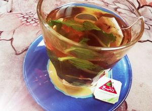 صورة لوصفة شاي أخضر مع أوراق النعناع لتخفيف الوزن ☕