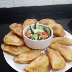 A picture of Fried Calzoni (Vegetable Samoosa).