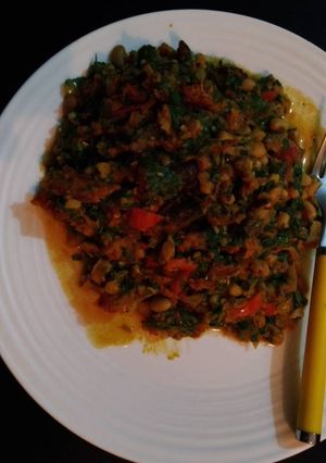 A picture of Beans with tomatoes and vegetable.