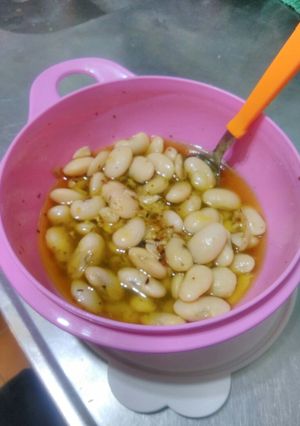 Una foto de Porotos en aceite